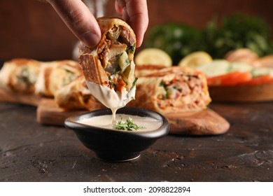 Chicken shawarma durum doner kebab copy space. kafta shawarma chicken pita wrap roll sandwich traditional arab mid east food


