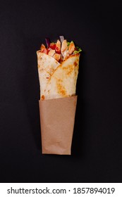 Chicken Shawarma On A Dark Background. Shawarma With Chicken In Pita Bread