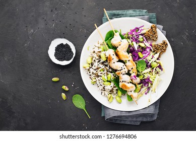 Chicken Skewers With Coleslaw On A Dark Background. Top View.