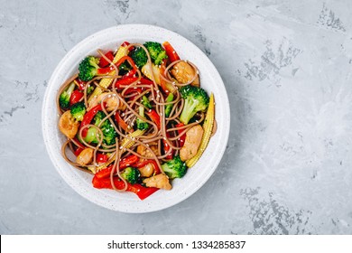 Chicken Stir Fry Noodles Bowl With Broccoli. Top View