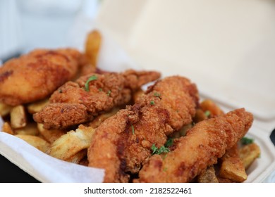 Chicken Tenders On A Bed Of French Fries