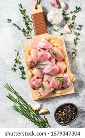 Chicken Thigh Fillet Cut Into Cubes. Gray Background. Top View