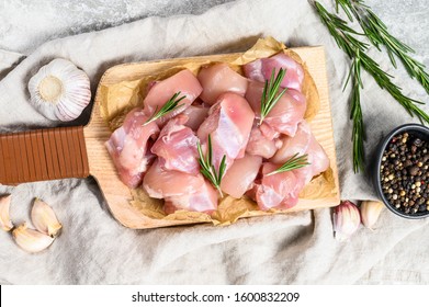 Chicken Thigh Fillet Cut Into Cubes. Gray Background. Top View