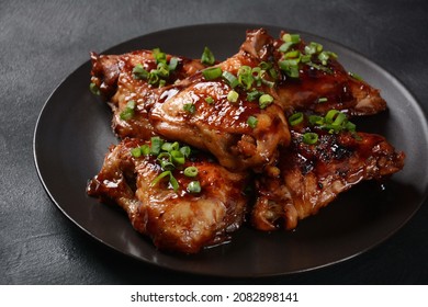 Chicken thighs marinated and cooked in adobo sauce. National filipino dish. 