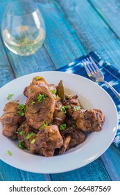 Chicken thighs marinated and cooked in adobo sauce
