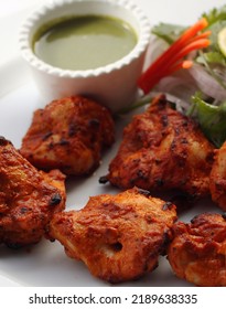 Chicken Tikka With Coriander Chutney And Onions