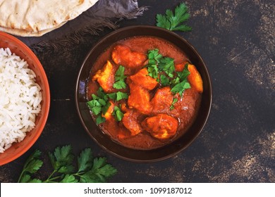 Chicken tikka masala with rice. Asian-Indian dish. Top view, copy space