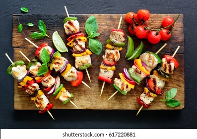 Chicken Or Turkey And Vegetables Cooked Spicy Skewers Put On A Board, Ready To Be Served As Summer Party Meal, View From Above