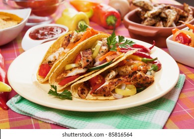 Chicken And Vegetable Salad Served In Taco Shells