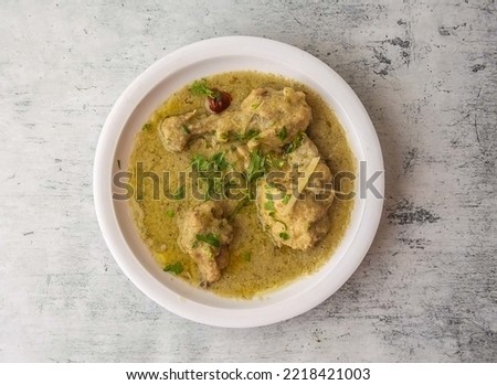 chicken white karahi served in a plate isolated on background top view of indian and pakistani desi food
