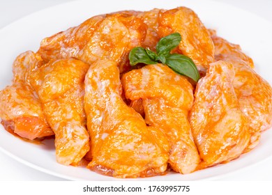 Chicken Wing In A Honey Mustard Marinade On A White Background Close-up. Raw Chicken Prime  Wings. 