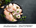 Chicken wing, raw chicken meat with herbs.