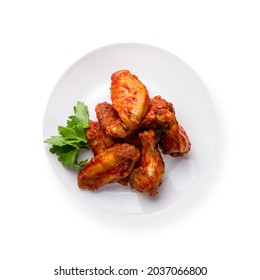 Chicken Wings In Barbecue Sauce On White Plate Isolated On White Background Top View