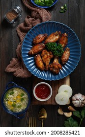 Chicken Wings And Broccoli Corn Soup Prepared On Black Wood Table. Food Photography, Low Light Food Photography. 