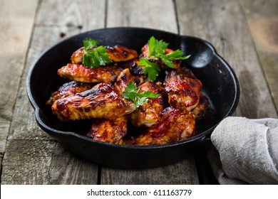Chicken wings in cast iron skillet