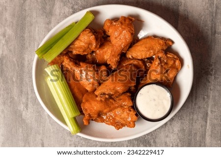 Chicken wings with celery and blue cheese dressing