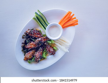 Chicken Wings With Cucumber, Carrot And Jicama.