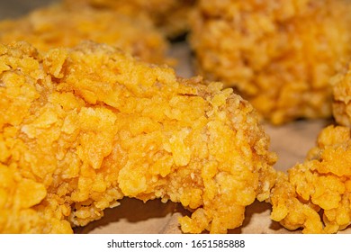 Chicken Wings Fried In Breadcrumbs On A Grey Paper Background. Close Up.