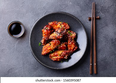 Chicken Wings. Traditional Asian Recipe. Dark Background. Top View.