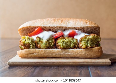 Chickpea Falafel Sandwich With Tomatoes And Sauce