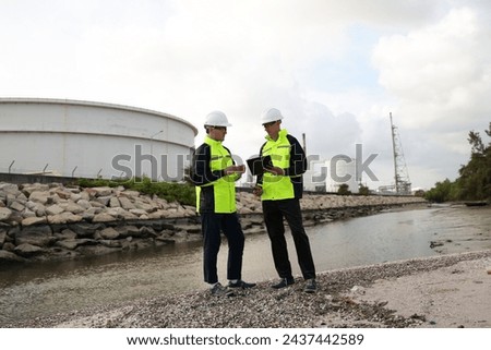 Chief of Construction engineer planning and briefing for safety and building a factory in oil refinery plant, cooperation work together teamwork concept.