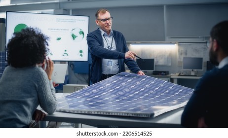 Chief Engineer Points at Projection Screen and Talks About Green Energy and Solar Panels Future Possibilities. Engineering and Sustainable Energy Higher Education Concept. - Powered by Shutterstock