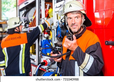 Chief Of Fire Department  Checking Radio Connection
