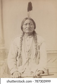 Chief Sitting Bull Holding Peace Pipe In 1885 Photo. When Signing On With BUFFALO BILLS WILD WEST Show, Sitting Bull Negotiated Exclusive Rights Over The Sale Of Photographs Of Himself