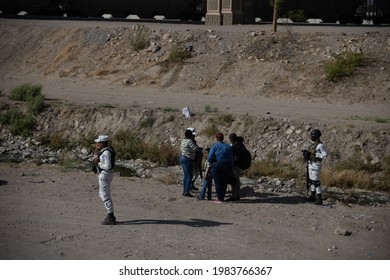 Juárez, Chihuahua, Mexico, 05-10-2021 National Guard Detains A Family Of Migrants From Haiti, The Family Tried To Cross The Rio Grande Illegally To Reach The United States To Request Political Asylum.