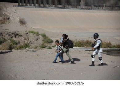 Juárez, Chihuahua, Mexico, 05-10-2021 National Guard Detains A Family Of Migrants From Haiti, The Family Tried To Cross The Rio Grande Illegally To Reach The United States To Request Political Asylum.