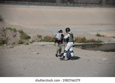 Juárez, Chihuahua, Mexico, 05-10-2021 National Guard Detains A Family Of Migrants From Haiti, The Family Tried To Cross The Rio Grande Illegally To Reach The United States To Request Political Asylum.