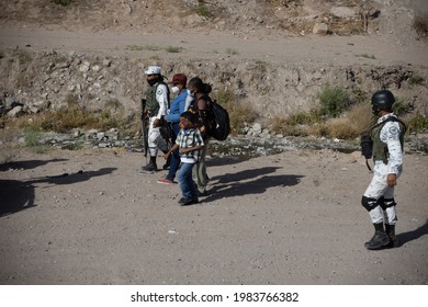 Juárez, Chihuahua, Mexico, 05-10-2021 National Guard Detains A Family Of Migrants From Haiti, The Family Tried To Cross The Rio Grande Illegally To Reach The United States To Request Political Asylum.