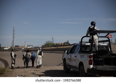 Juárez, Chihuahua, Mexico, 05-10-2021 National Guard Detains A Family Of Migrants From Haiti, The Family Tried To Cross The Rio Grande Illegally To Reach The United States To Request Political Asylum.