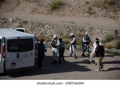 Juárez, Chihuahua, Mexico, 05-10-2021 National Guard Detains A Family Of Migrants From Haiti, The Family Tried To Cross The Rio Grande Illegally To Reach The United States To Request Political Asylum.