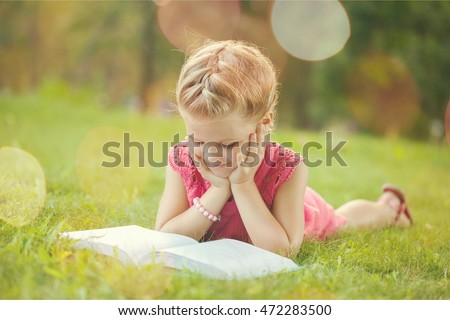 Similar – Image, Stock Photo smart kid girl reading interesting book