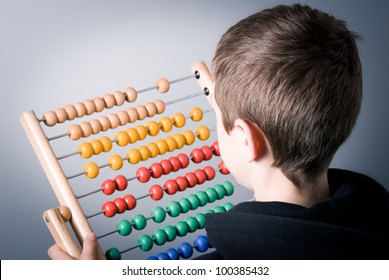 Child with abacus - Powered by Shutterstock
