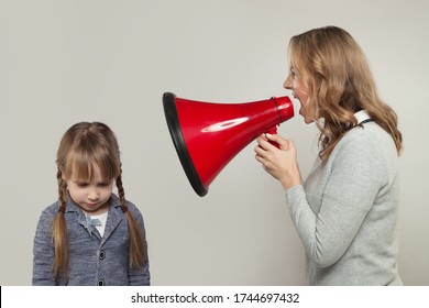 Child Abuse Concept. Parent Abusing Kid, Mother Shouting In Loudspeaker To Sad Daughter