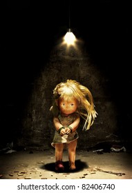 Child abuse - a doll in a dark room with hands tied and mouth sealed