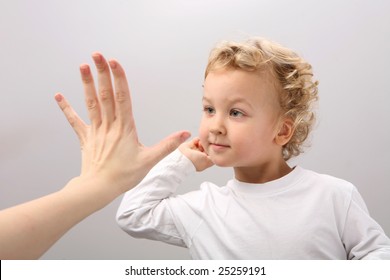 Child And Adult Clap Hands.