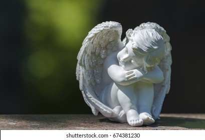 Child Angel Statue On Gravestone