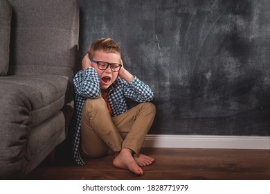 Child With Angry Expression. Alone Kid Shout. Child Abuse. School Kid Boy Bully And Sad. Violenc In Family Form Parent. Anxiety And Stress. Educational School Isolation And Bullying Concept.