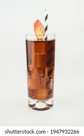 Child Apple Juice In A Glass, Apple Garnished Juice In A Tom Colins Glass Isolated White Background, With Full Depth Of Field.