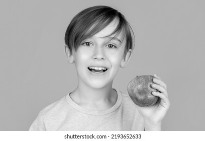 Child With Apples. Portrait Of Cute Little Kid Holding An Apple. Baby Boy Eating Apple And Smiling. Little Boy Eating Apple. Boy Apples Showing. Boy Smiles And Has Healthy White Teeth. Black And White