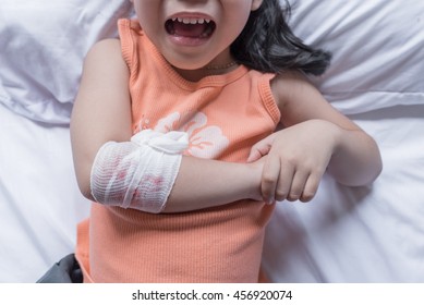 Child Arm With Gauze Bandage