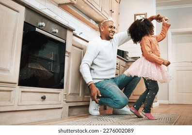 Child, ballet dance twirl and happiness of girl and father together bonding with dancing in the kitchen. Home, kid and dad with parent love and care in a house playing a dancer game for children fun