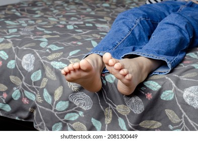 Child Bare Feet Jeans Lying On Stock Photo 2081300449 | Shutterstock