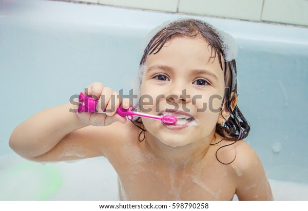 Mother And Children Having Bubble Bath High-Res Stock 