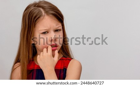 Child biting nails as concept of autoaggression