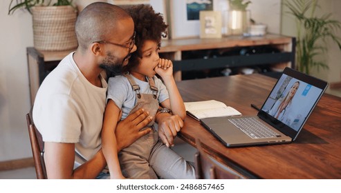 Child, black man and laptop screen with doctor for telehealth service, communication and advice. Home, boy and father with pediatrician on tech for medical support, discussion or virtual consultation - Powered by Shutterstock