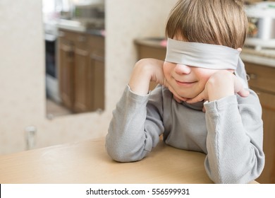 The Child Was Blindfolded At Home